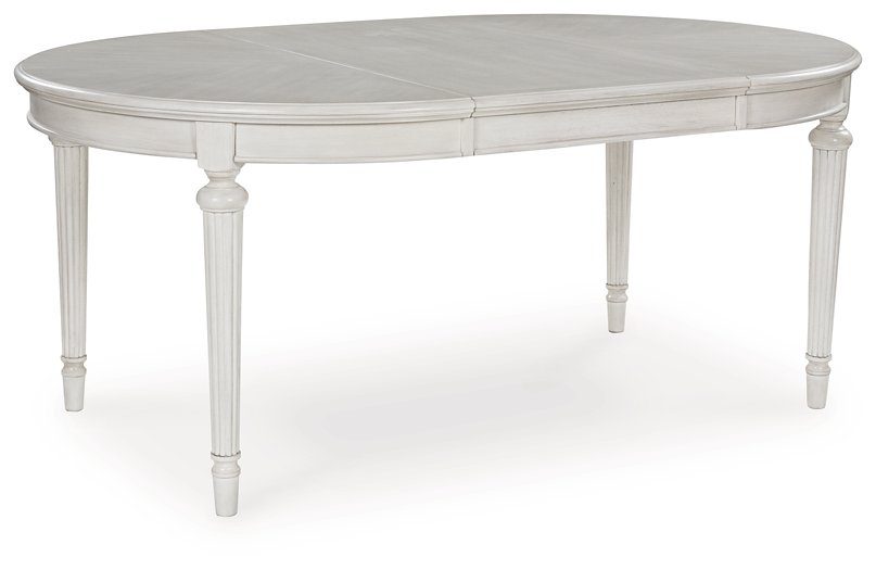 Montelaine Dining Extension Table - 46 Furniture and Mattress Gallery