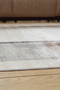 Larkport Washable Area Rug - 46 Furniture and Mattress Gallery