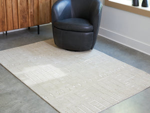 Wolbert 5' x 7' Area Rug - 46 Furniture and Mattress Gallery